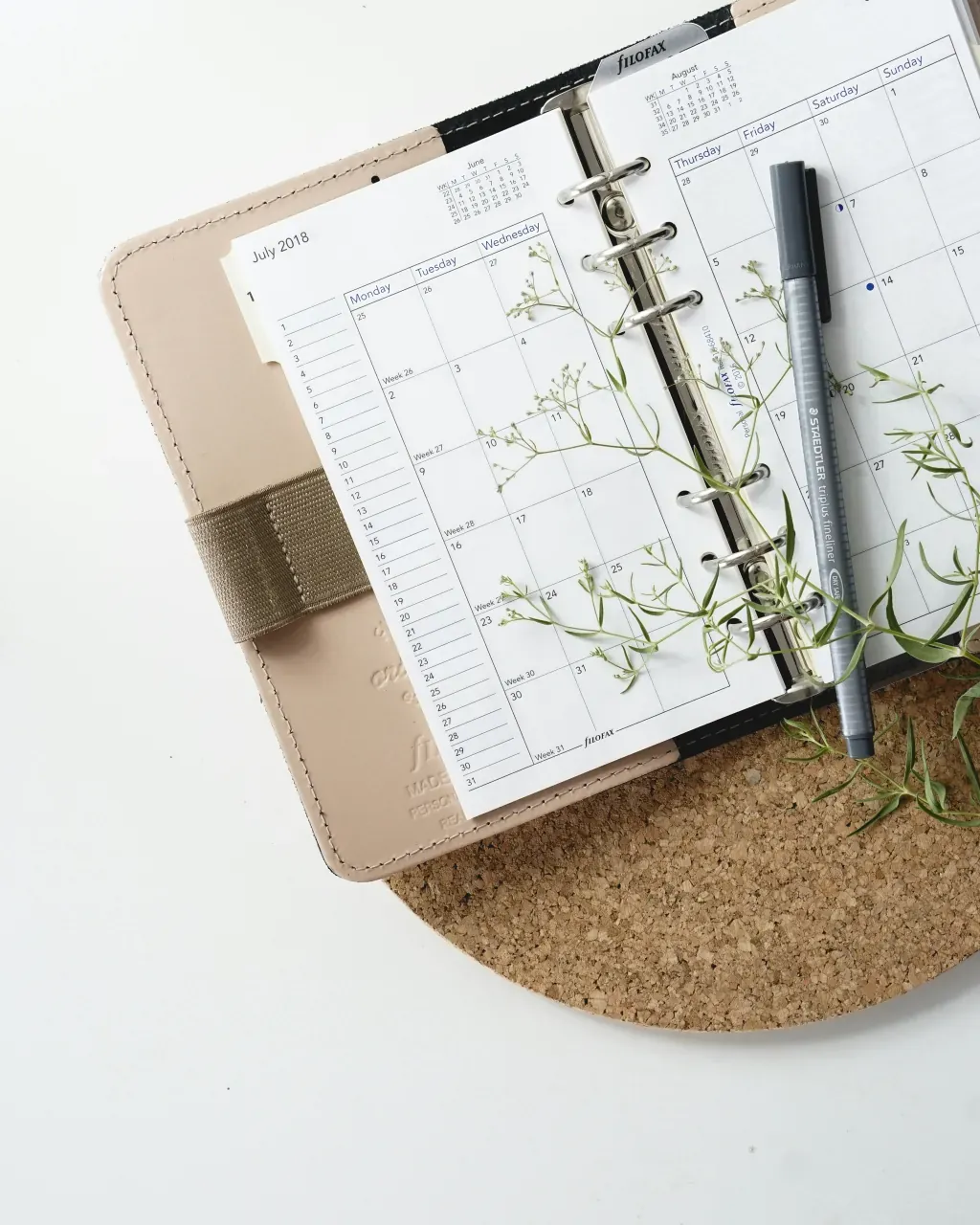 Kalender und Stift für Terminplanung